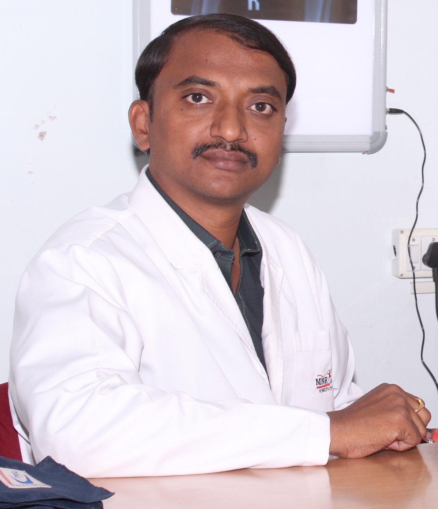 Dr.CH.K. SUMAN