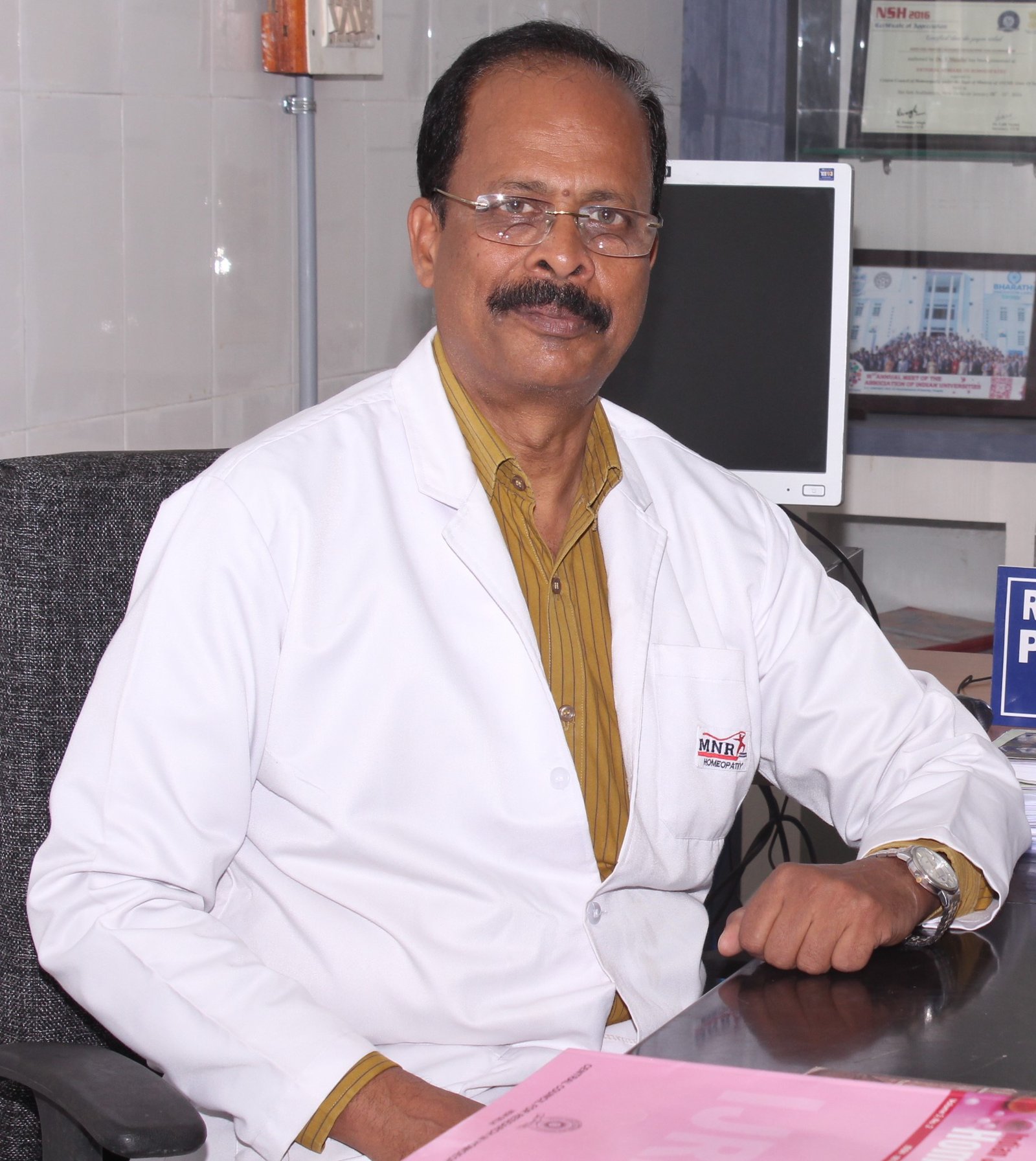 DR.S.MANILAL